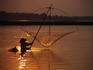 Dip net shrimp fishing in Mekong River.
