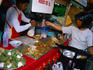 A drive-through scooter snack can be arranged cheaply in Phuket Town