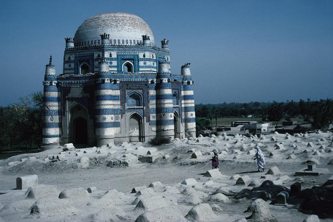 Exterior view of the Mausoleum of Bibi Jawindi ( Gholan Fatima ) with the graveyard in foreground - Uch Sharif, Punjab