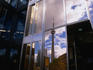 The 1815.5 foot tall CN Tower in Toronto reflected in glass.
