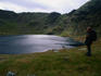 Beneath the summit of Helvellyn, enclosed in the arms of Striding Edge and Swirral Edge, is Red Tarn, possibly one of the best known tarns in The Lake District