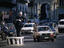 A uniformed member of the famous Carabinieri directing traffic on Piazza Venezia
