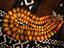 Amber beads on mud cloth, Mamadou Traore's compound.