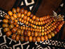 Amber beads on mud cloth, Mamadou Traore's compound.