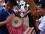 A Lam band with traditional Isan instruments, a hand drum and the khaen, a reed-free bamboo mouth organ, Chiang Mai.