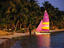 Sail boat on beach.