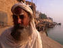 A peacful Sadhu, worshipper of Vishnu, sits quietly by the River Ganges in Varanasi.