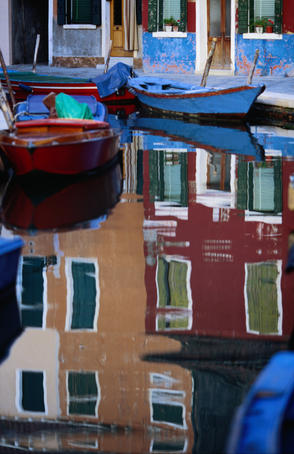 Reflections of Burano, a small island known for its lace industry in Venice