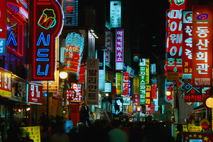 Neon signs in street.