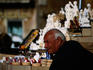 A souvenir seller with various types of gifts for sale on Piazza Navona, Rome
