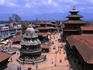 On the left on Durbar Square in Patan is the unusual octagonal Krishna Temple which Pratapa Malla built in memory of two of his favorite queens