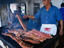 Chef Fernando Uicamp griling beef at La Palapa Costillas in Cozumel.