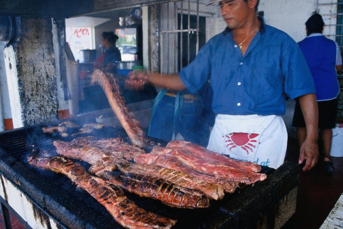 Chef Fernando Uicamp griling beef at La Palapa Costillas in Cozumel.
