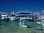 Glass bottom boats and passenger ferries moored in Cozumel.