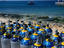 Diver oxygen tanks lined up on Cozumel beach.