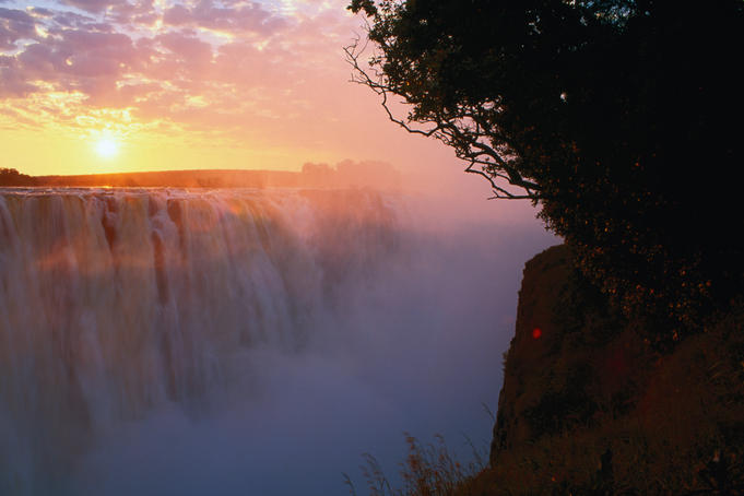 Victoria Falls at sunrise.