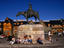 Relaxing beneath an equestrian statue of General Roca in the central plaza, which features log-and-stone buildings by architect Ezequiel Bustillo.