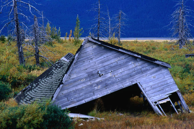 Portage ruins rest in countryside near Anchorage, Alaska.