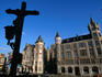 View from The Steen of Christ on the cross with gabled buildings along Jordaenskaai in the background.