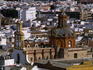 Aerial view of Seville with San Bernado church in the foreground.