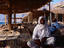 Bedouin men getting out of the searing sun, Sinai