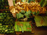 Men preparing banana leaves at Jayanagar Market.