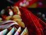 Traditional New Years Food 'Osechi Ryroi' packaged in an orange 'bento' box.