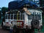 A fully laden local bus, complete with goats: a roadside scene on the journey from Bangui to Kembe Falls.