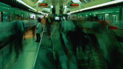 Rush hour at the bustling JR Hakata railway station.