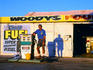 Service Station and nmanager in late afternoon light.