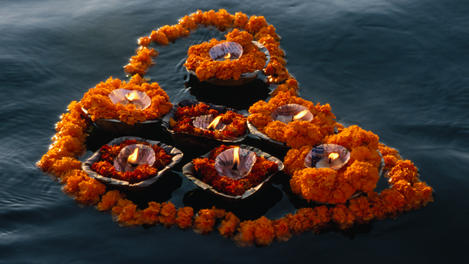 Flowers and candles, Ganges, Varanasi