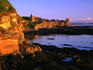 Ruins of St Andrews Castle at dawn.