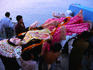 Devotees carry an effigy of Lakshmi down to the Hooghly River, marking the end of the Durga Festival. After 10 days, all statues and effigies of gods are placed in rivers, lakes and even wells.