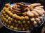 Tray of sweets from the Old Town of Hyderabad, from the left are laddus, in the middle are kajur and on the right are badusha