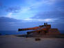 Ancient cannon rusting on the coast of Ile de Goree (Goree Island) - Dakar