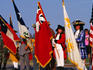 Performers holding flags for Annual Delta Jubilee in Clarkeville.