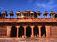 People sitting on the steps of Jama Masjid Mosque, also known as Dargah Mosque.