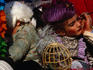 Children in costume and make-up taking part in Milan's lively Carnivale festival.