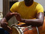 A conga player keeps the beat on the Mississippi Riverwalk.