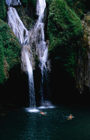 Swimmers at Salto del Caburni waterfall, Sierra del Escambray, near Trinidad.