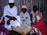 Children learning the Qur'an.