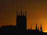 Spires and Tower of St Mary's Cathedral, circa 1843, Kilkenny is silhouetted against the sunset.