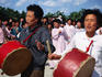 Local people playing drums in Nampo.