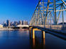 Taylor-Southgate Bridge over Ohio River with city in background.
