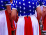 Participants in flag dresses for 4th July Independence Day Parade.