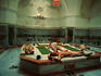 Men relaxing on the heated marble at the Historic Galatasaray Turkish Bath (Tarihi Galatasaray Hamami) - Beyoglu quarter.