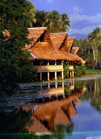 Historical Villa Escudero Plantations and Resort is set amongst tropical coconut trees on a peaceful lake, San Pablo