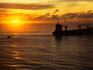 Phosphate bulk carrier off the cost of Nauru at sunset.