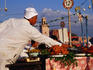 A food vendor in the Djemmaa el-Fna, Marrakesh. This huge square in the medina is a fascinating backdrop for all kinds of open air stalls, performers and spectators.