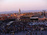 Djemmaa el-Fna, the huge square in the medina of Marrakesh, crammed with a myriad of stalls, performers and spectators.